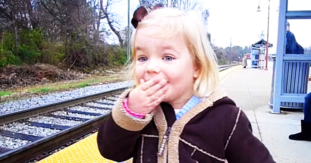 Excited Girl Sees Train