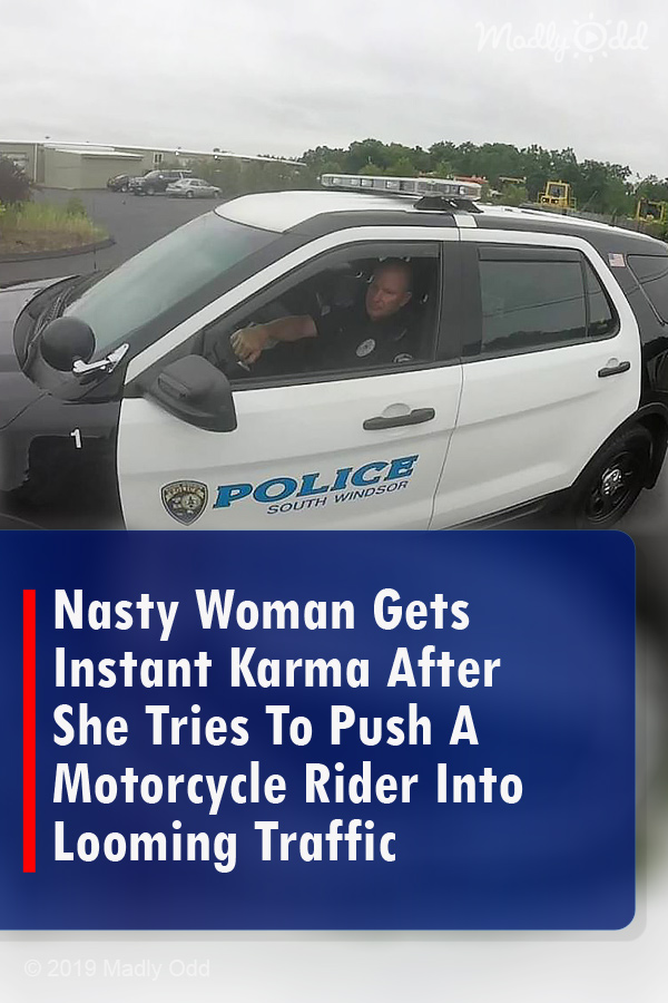 Nasty Woman Gets Instant Karma After She Tries To Push A Motorcycle Rider Into Looming Traffic