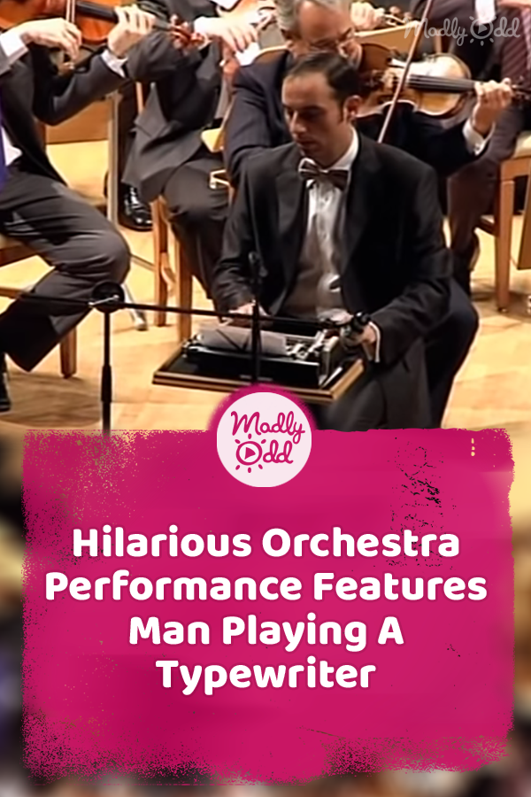 Hilarious Orchestra Performance Features Man Playing A Typewriter