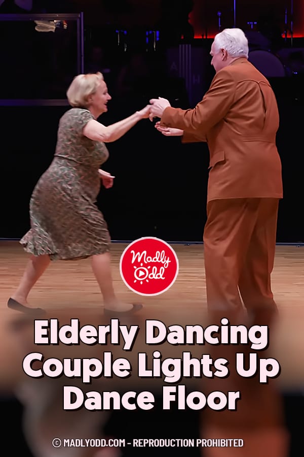 Elderly Dancing Couple Lights Up Dance Floor