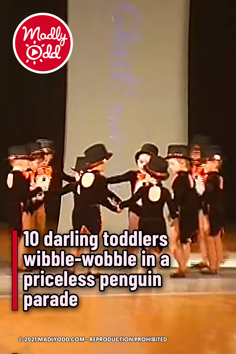 10 darling toddlers wibble-wobble in a priceless penguin parade