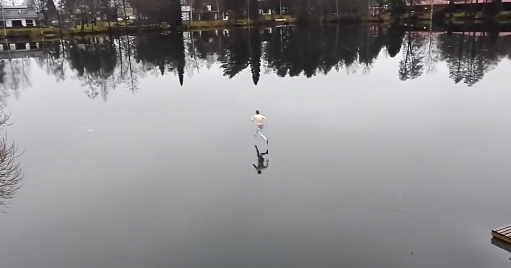 Man running across lake