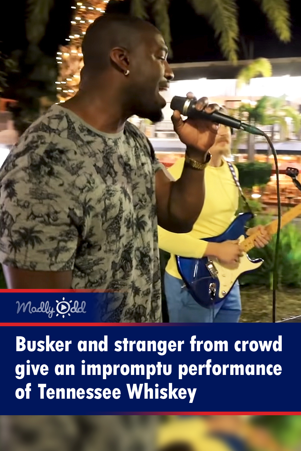 Busker and stranger from crowd give an impromptu performance of Tennessee Whiskey