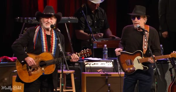 Close-up of Willie and Merle Haggard performing